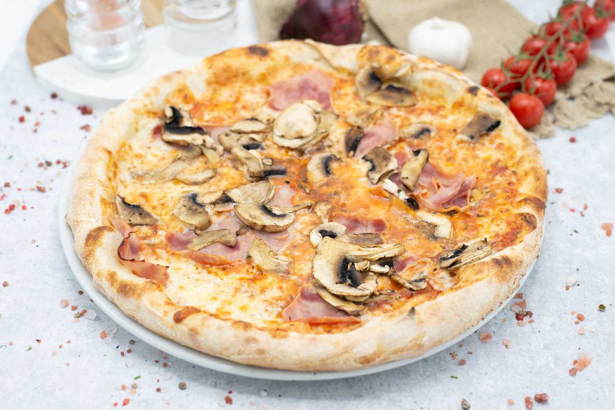 Pizza prosciutto & funghi