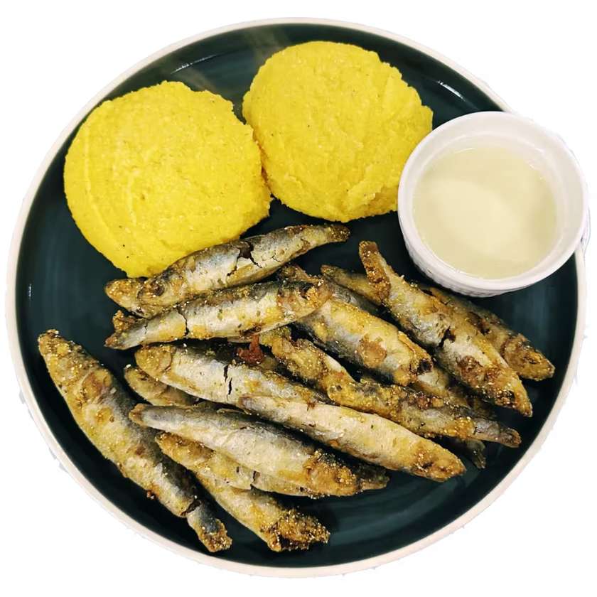 Anchovies with polenta and garlic sauce