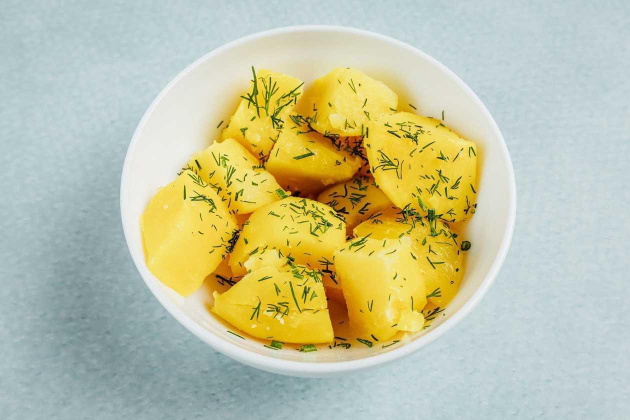 Boiled potatoes with parsley and butter
