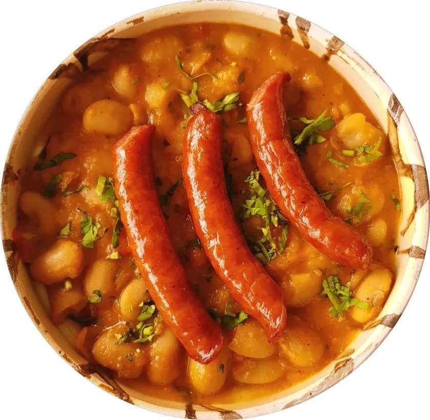 Stewed beans with homemade sausages or cabanos sausages