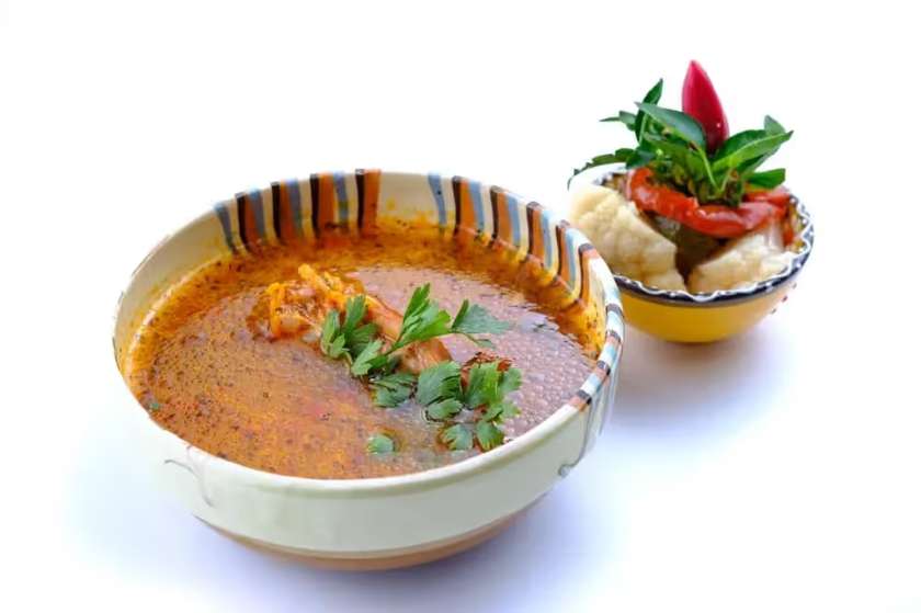 Potato soup with tarragon and smoked meat