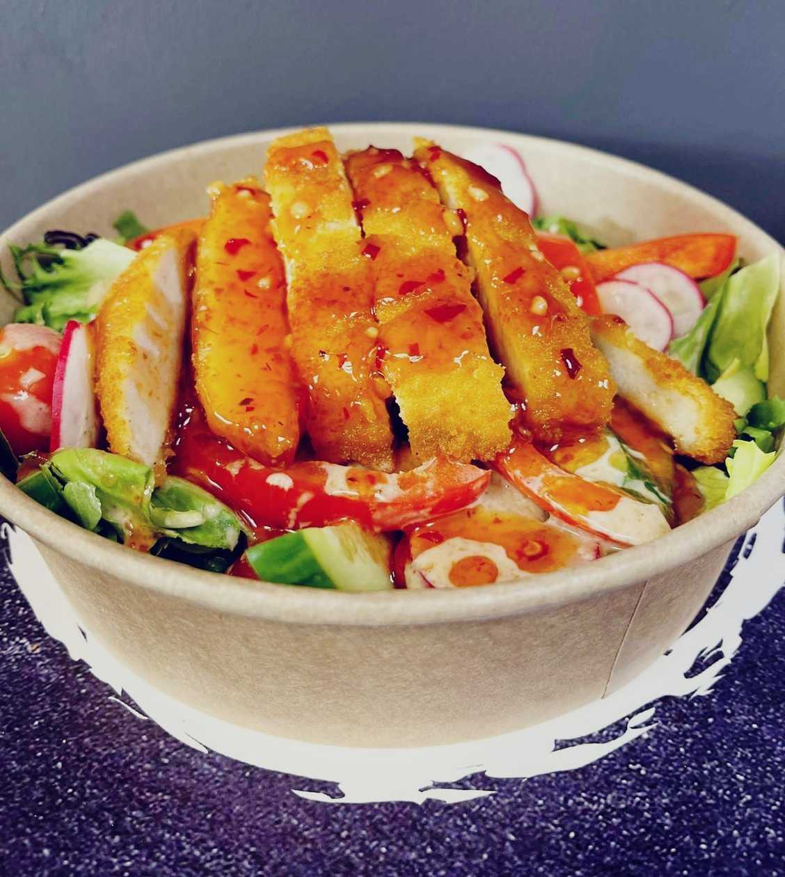 Fresh salad with fried crispy chicken.