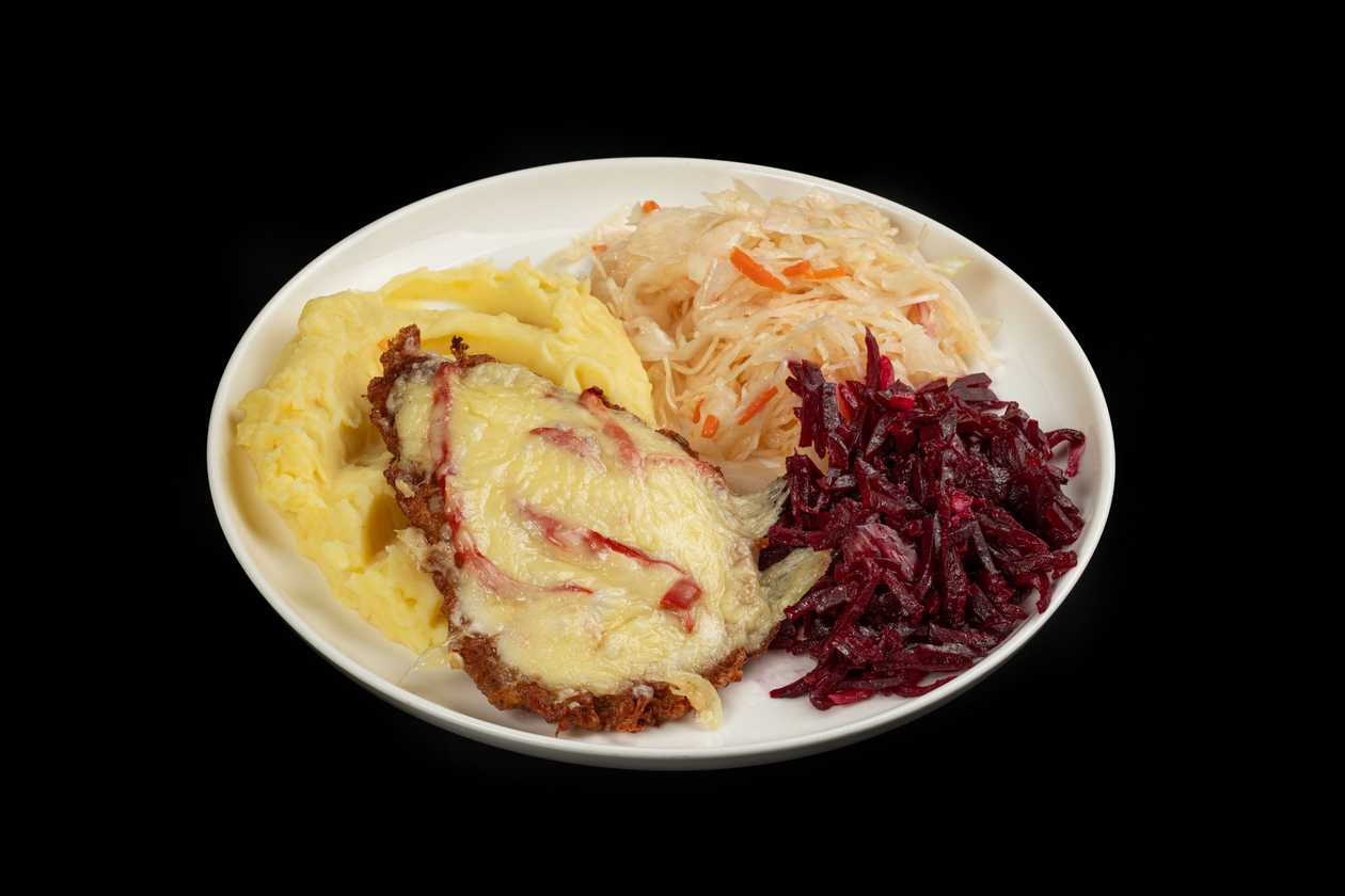 Pork steak baked with tomatoes