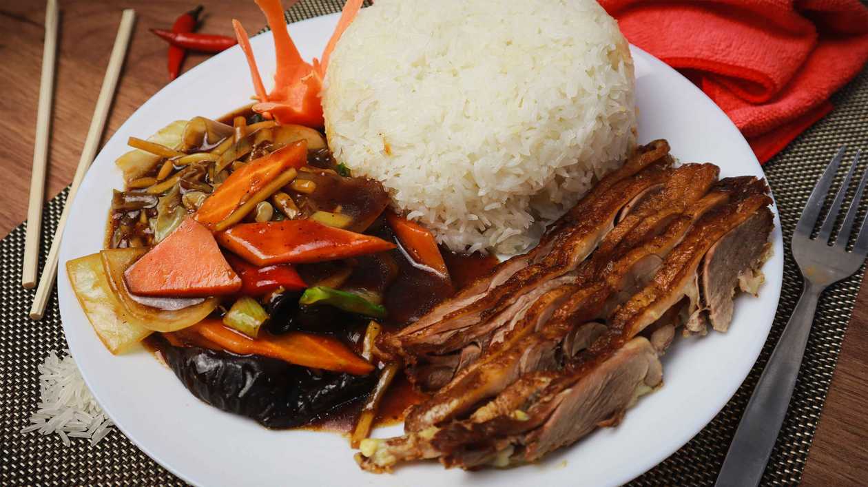 Duck with vegetables and rice