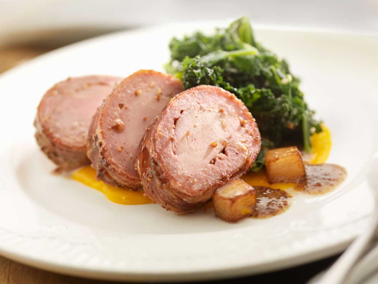 Pork tenderloin medallions, baked potato, chanterelle mushroom sauce