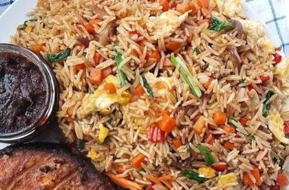 Fried rice with sausage fried plantain or fried egg