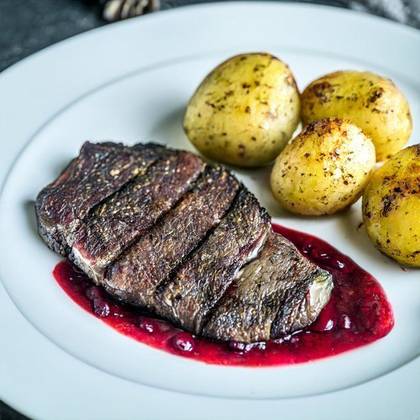 Flank steak, roasted potato, cranberry sauce