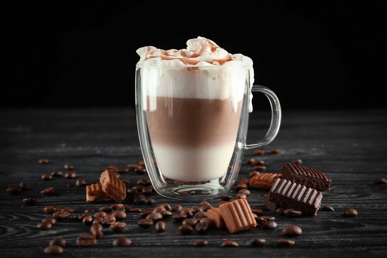 Invincible Viennese macchiato with whipped cream and topping