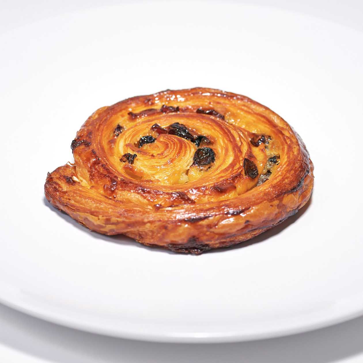 Escargot with custard, raisins and cranberries