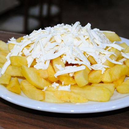 Fries with cheese cow