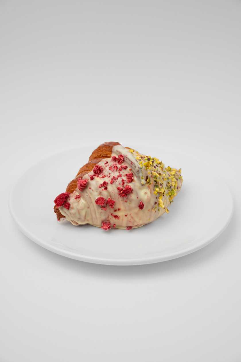 Pistachio and raspberry croissant