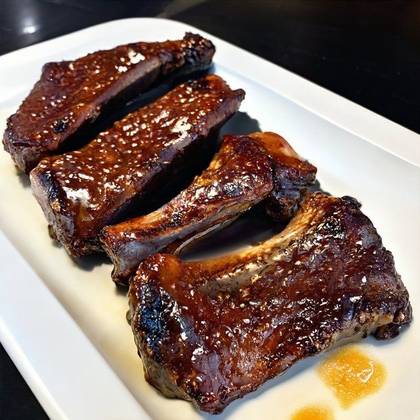 Roasted meaty smoked ribs