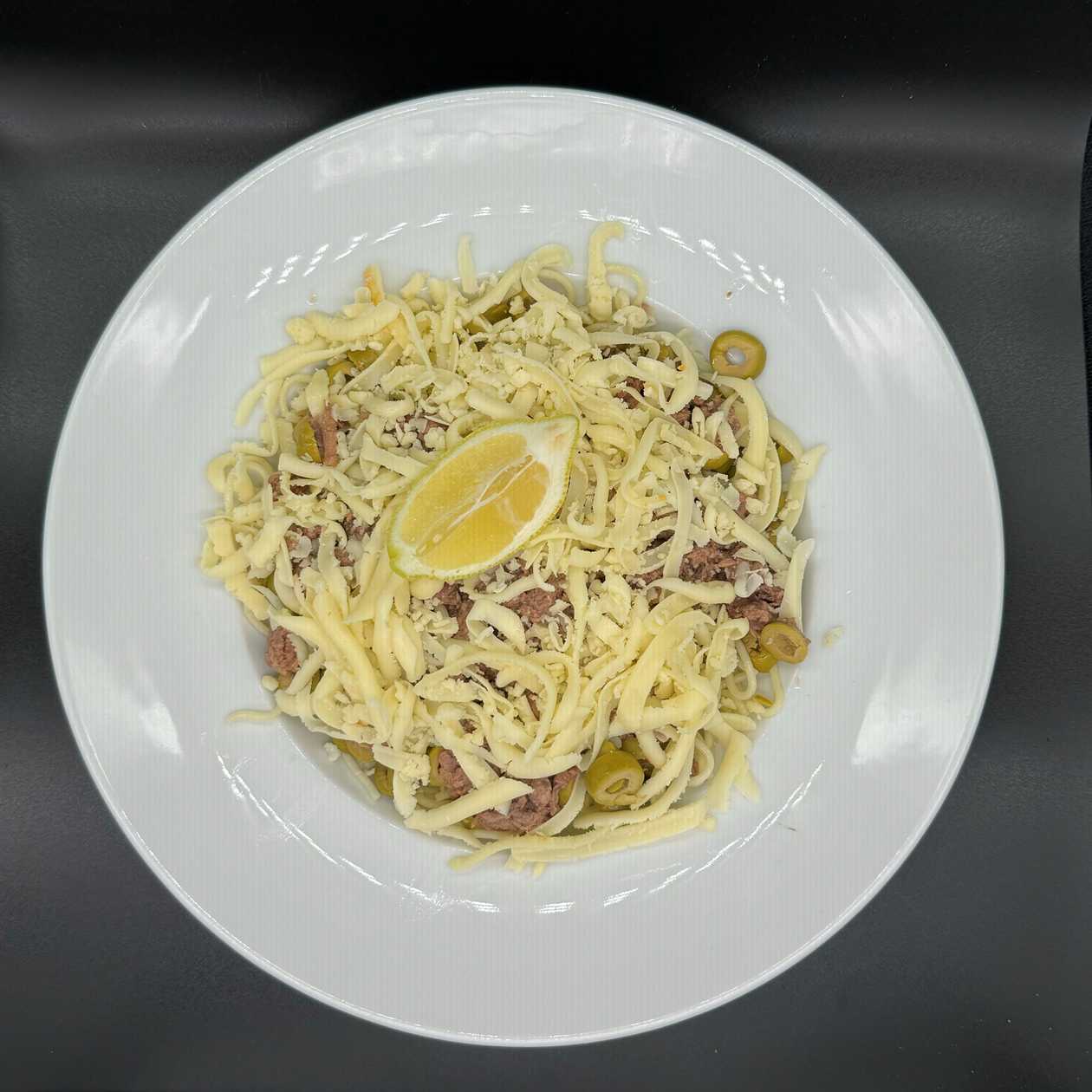 Half portion of spaghetti with tuna