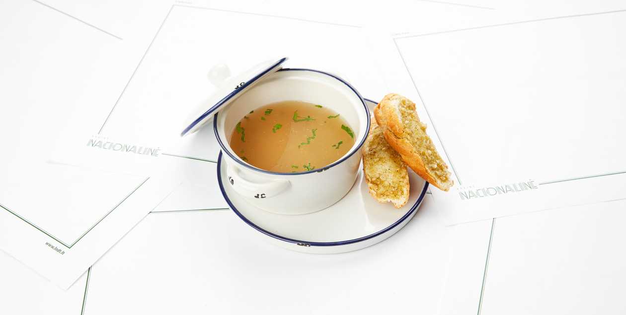 "National" broth with a slice of baguette