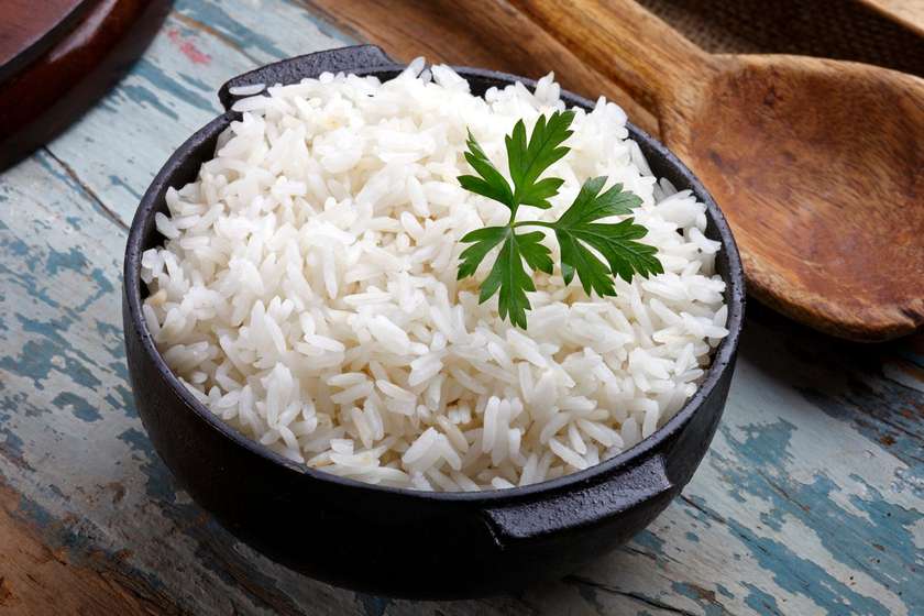 White Rice with peppered Pomo(Wele) sauce.