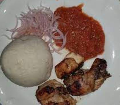 Two Large Balls of Banku with Chicken Stew