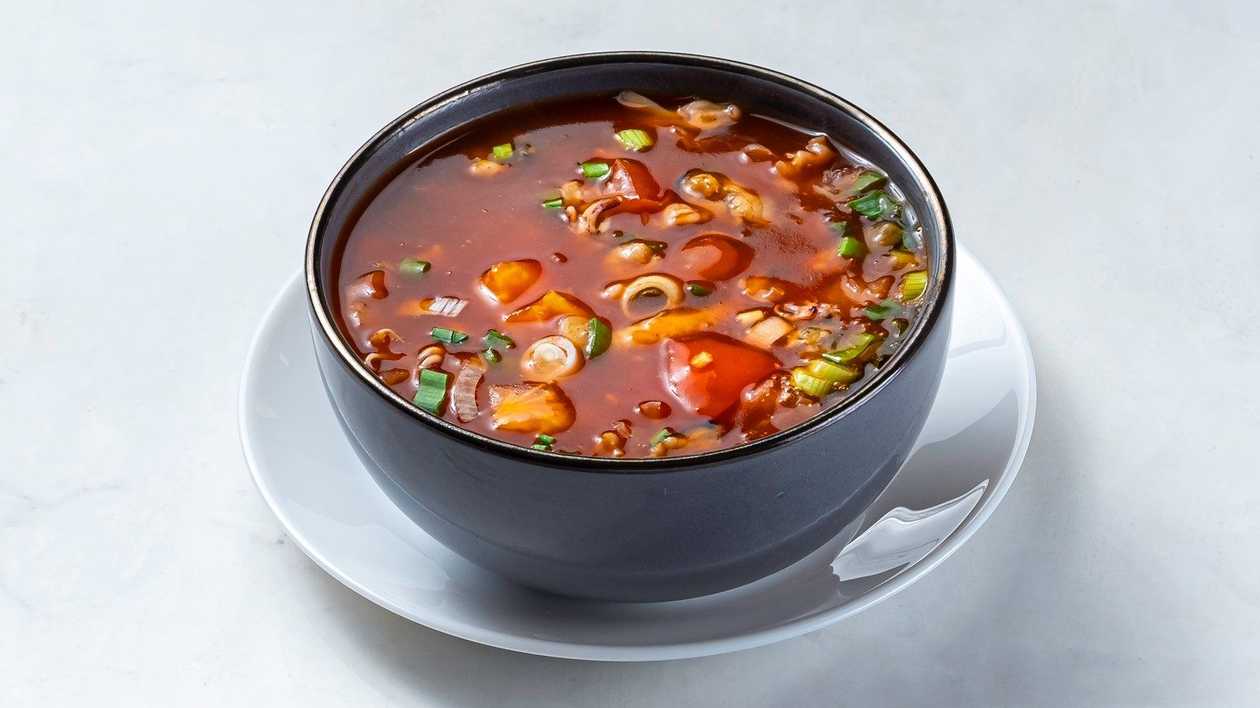 B6. Seafood soup with tomato sauce