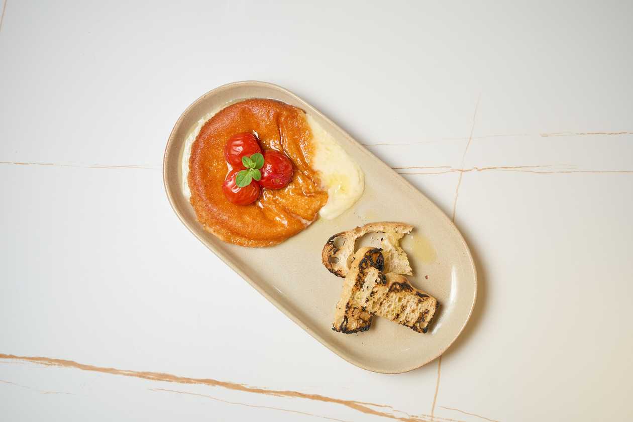 Provoleta with Oregano and Tomatoes