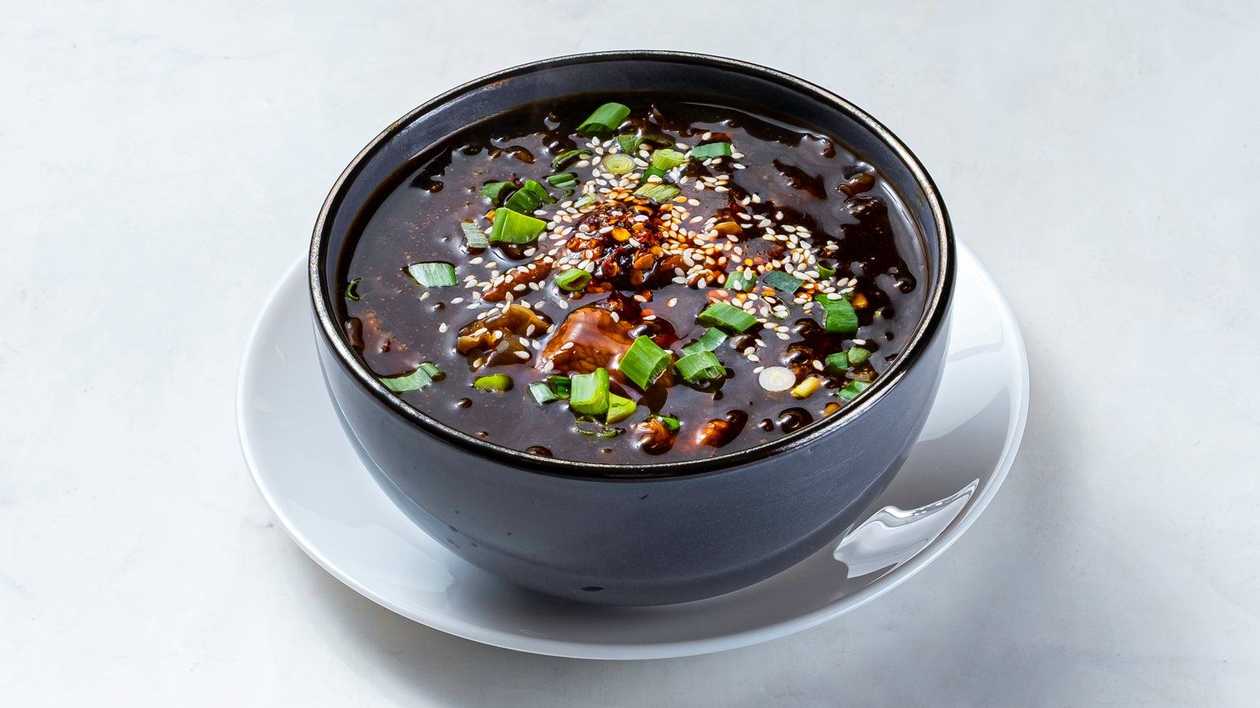 B9. Spicy beef soup with sesame