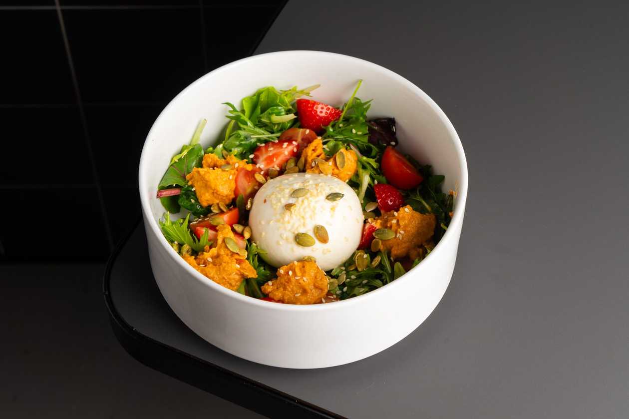 Burrata salad with tomato hummus
