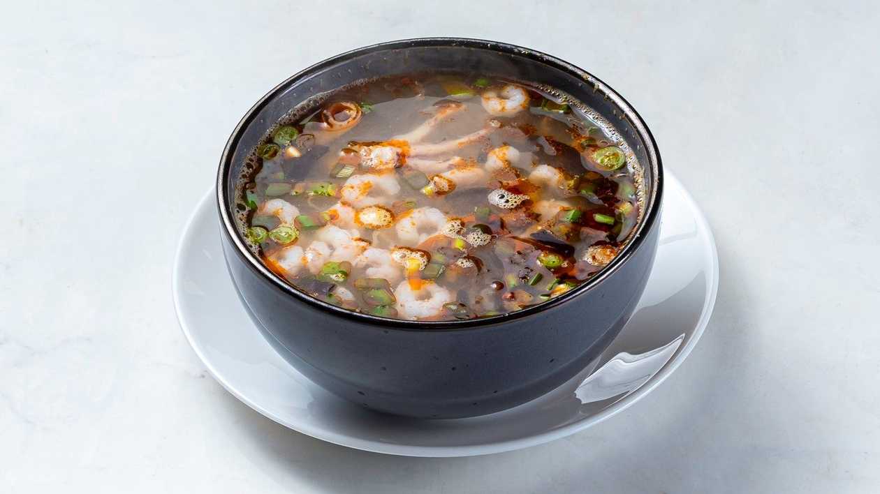 B7. Spicy sweet and sour seafood soup