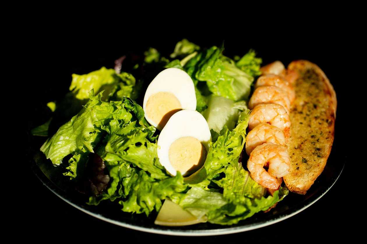 Classic Caesar salad with prawns