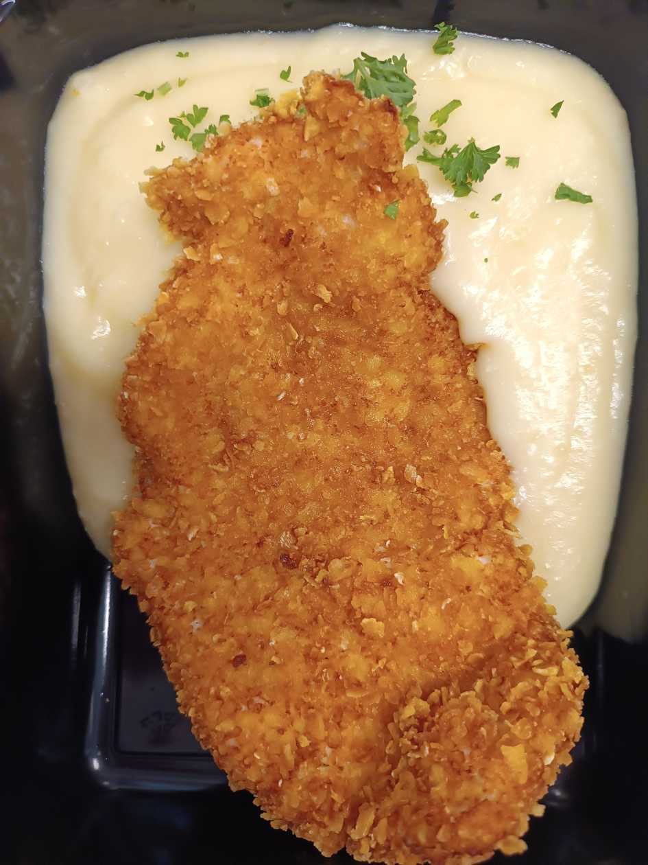 Fried chicken schnitzel Corn Flakes, mashed potatoes