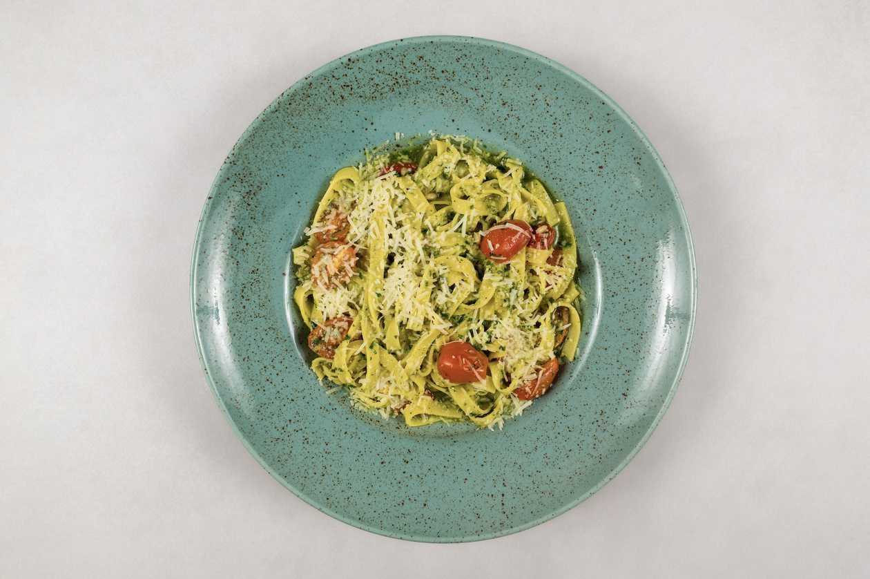 Tagliatelle with green pesto and burrata