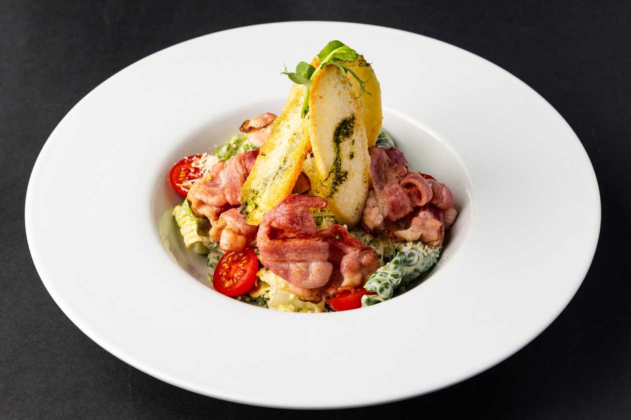 Caesar salad with bacon