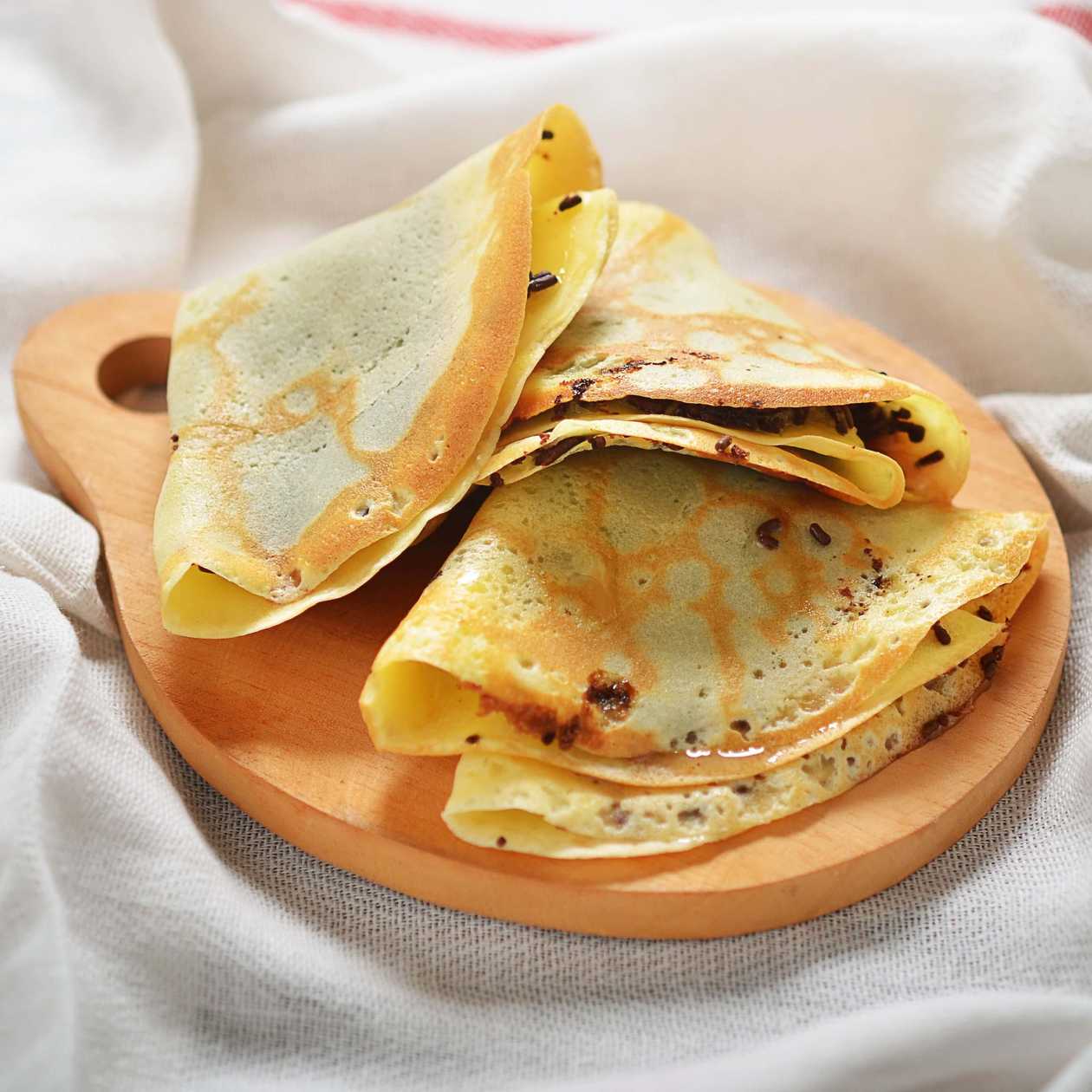 Pancakes filled with apricot jam