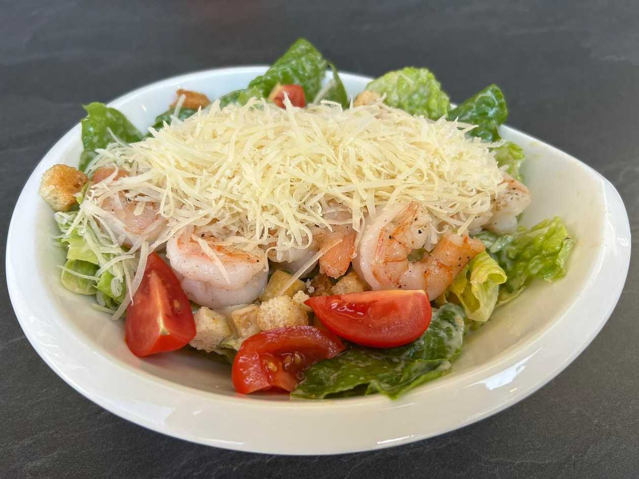 Caesar salad with tiger prawns