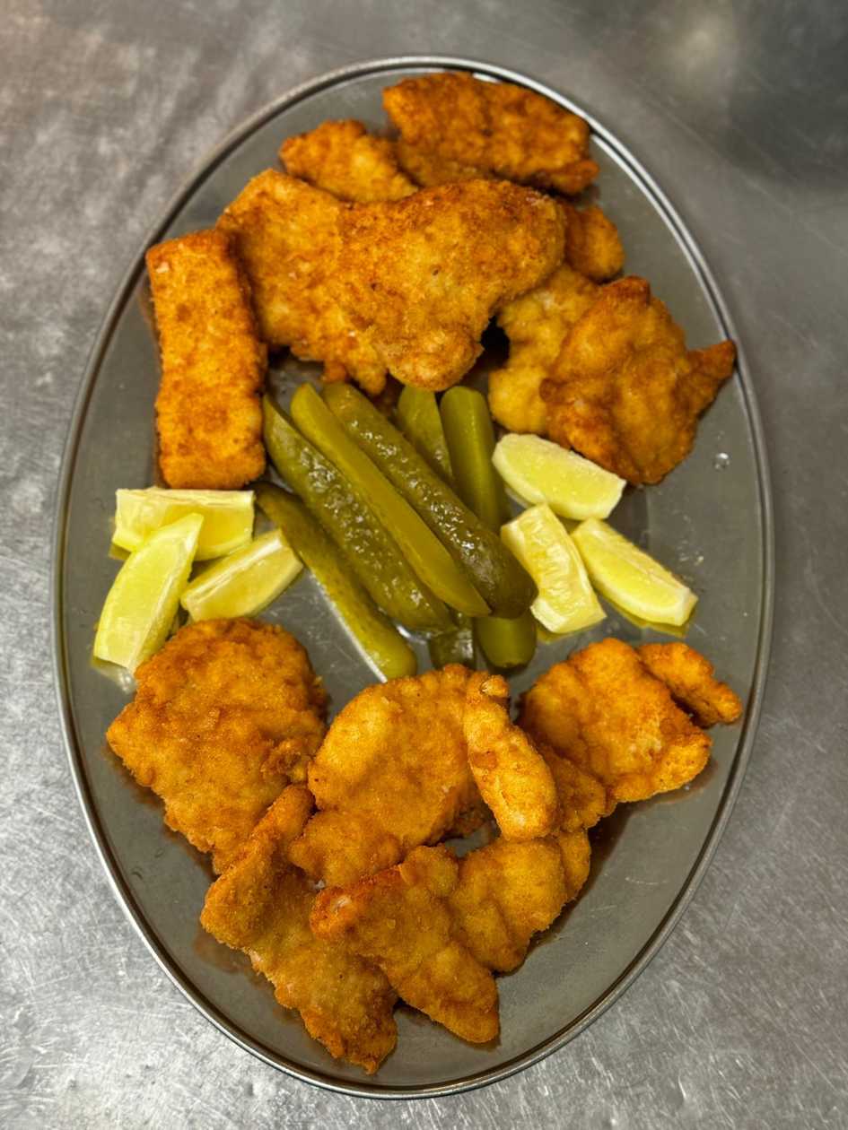 Fried mini pork and chicken schnitzels