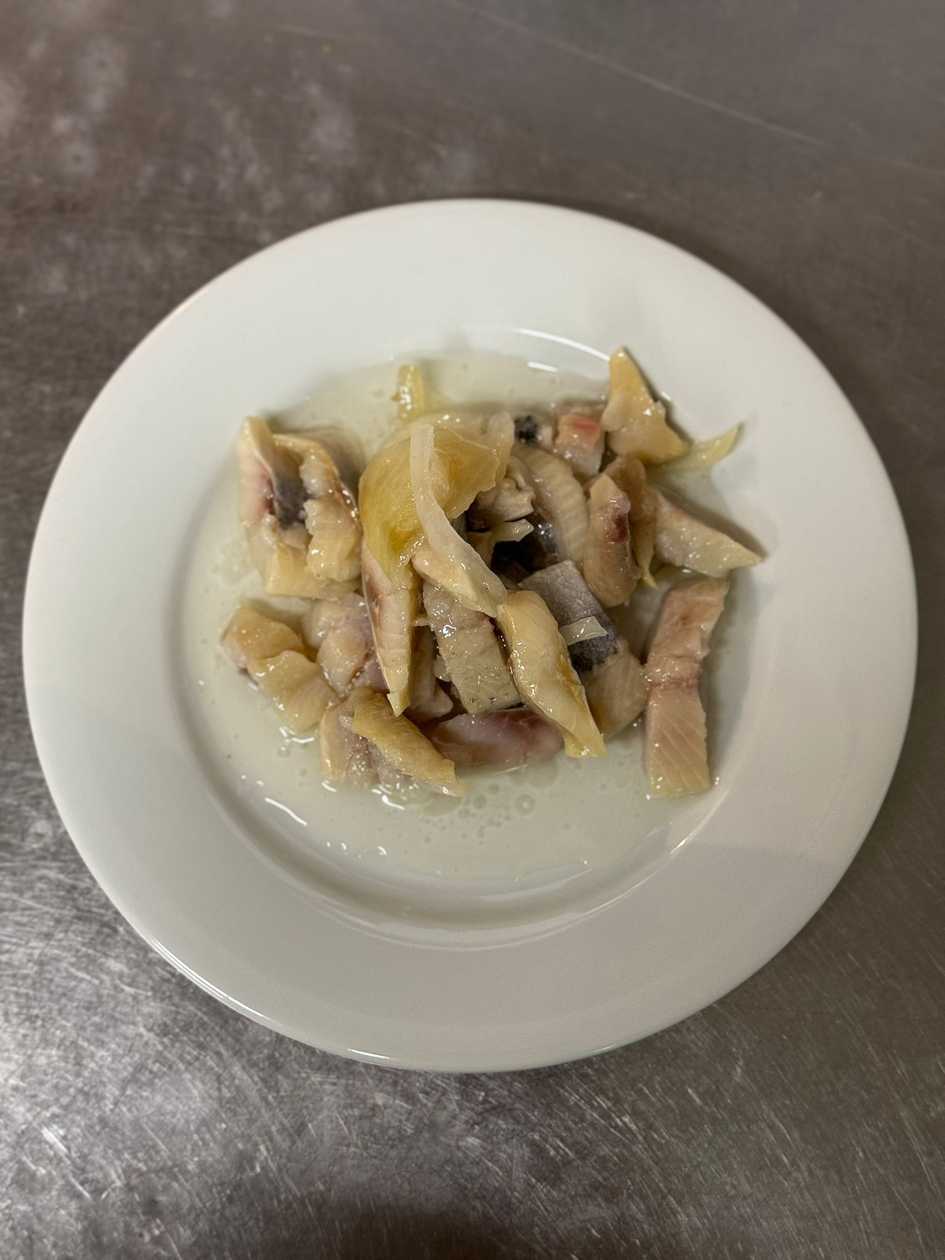 Pickled herring with onions and bread