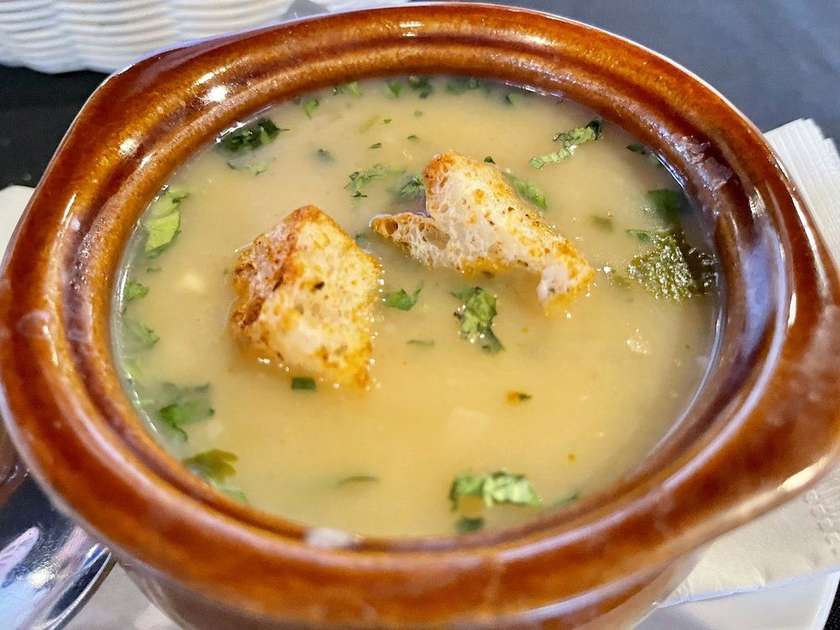 Garlic soup with cheese and bread croutons