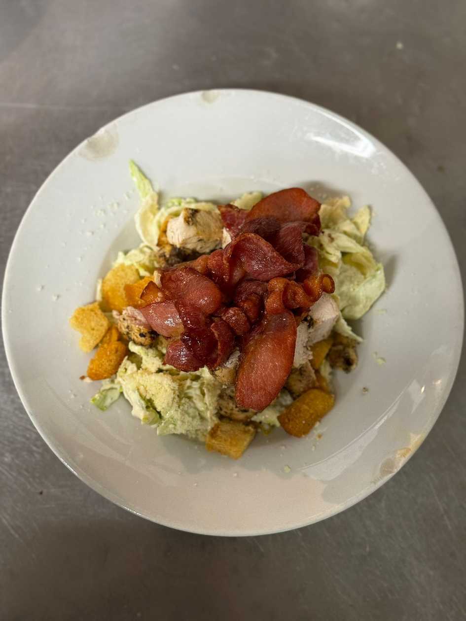 Pork tenderloin and chicken breast mix with parmesan sauce