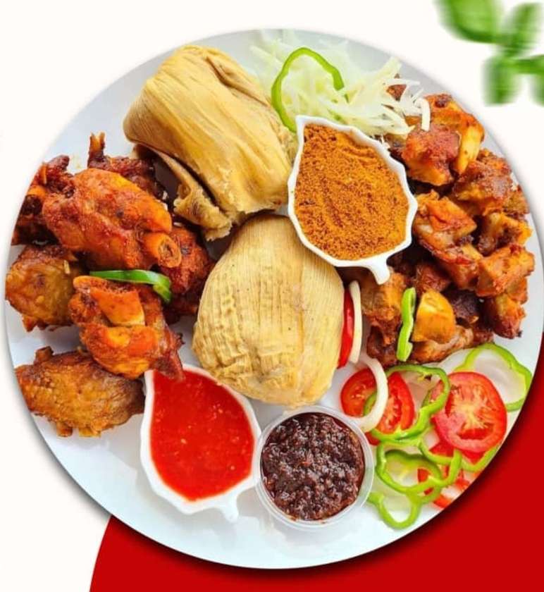 Kenkey spicy fried sausages /gizzard and chofi