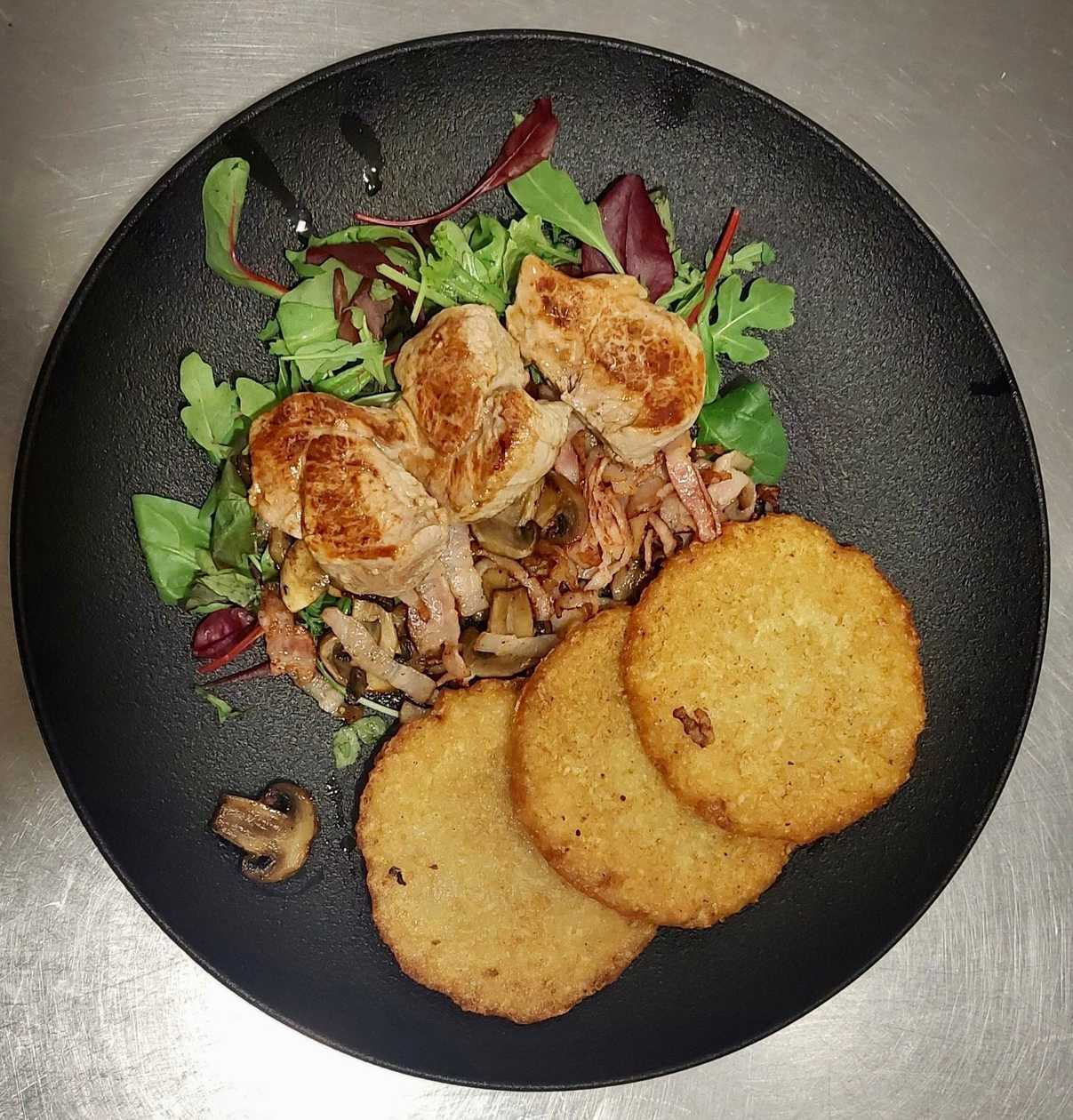 Pork medallions on potato pancake