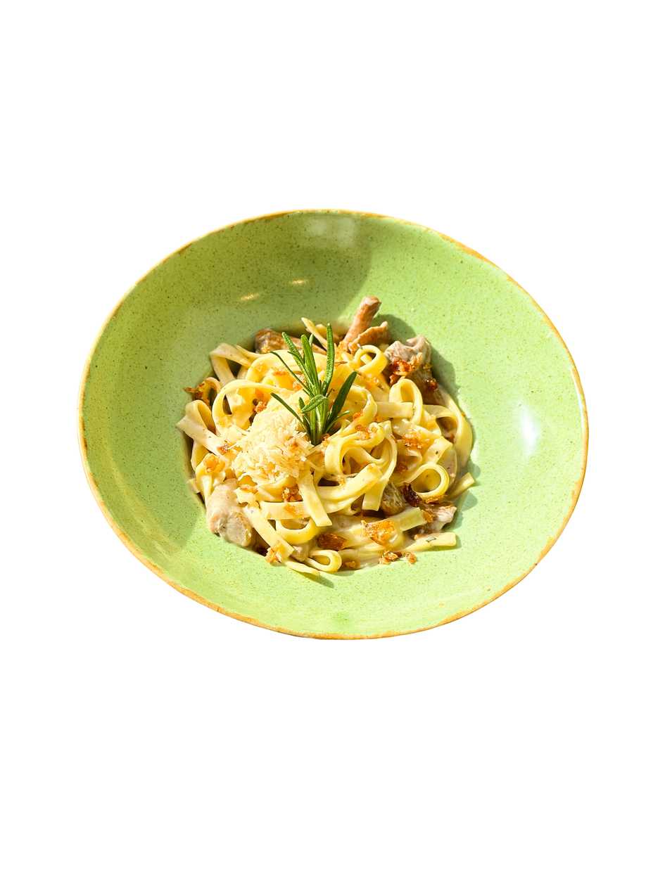 Tagliatelle with truffle paste, porcini mushrooms and chanterelles