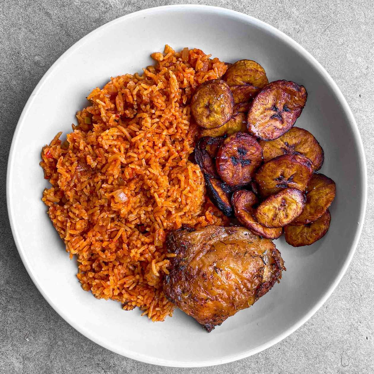 Jollof Rice With Drum thicks And Plantain