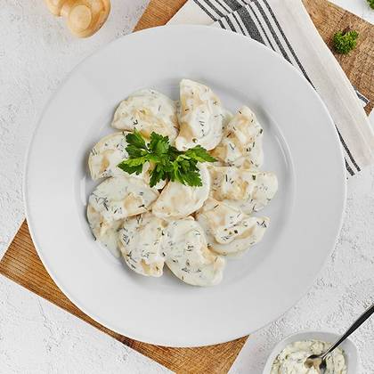 Potato Dumplings with cheese sause dressing