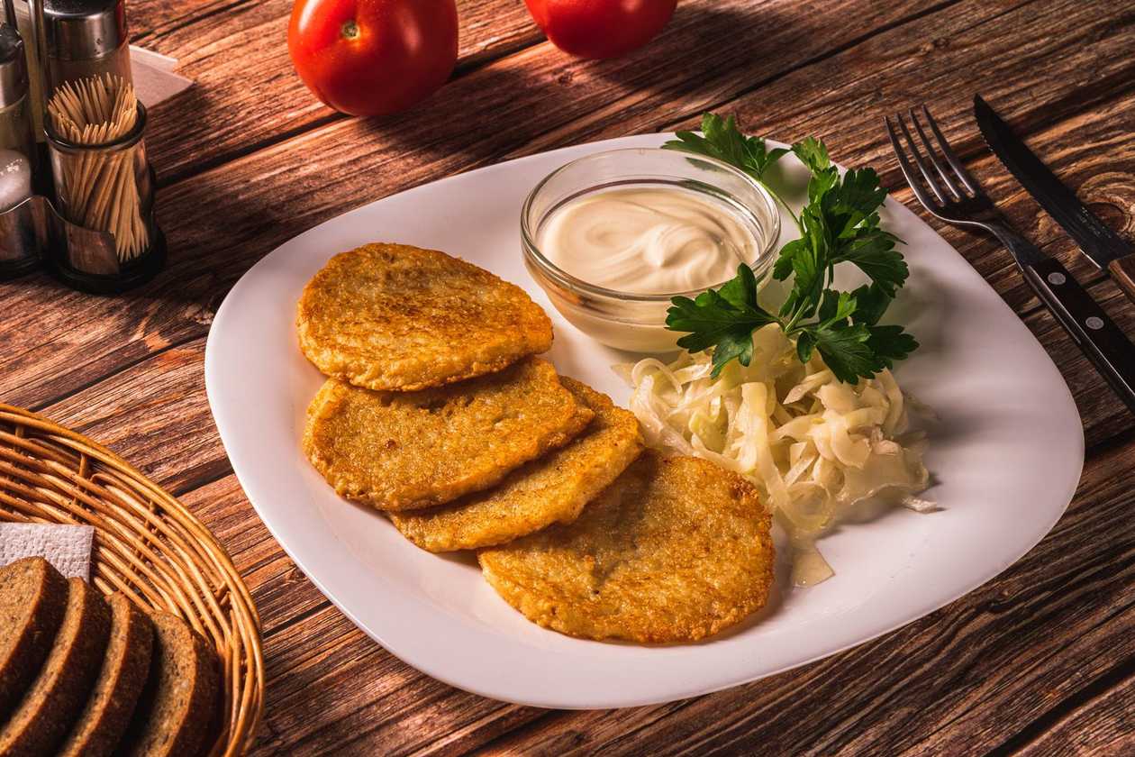 Potato pancakes with sour cream