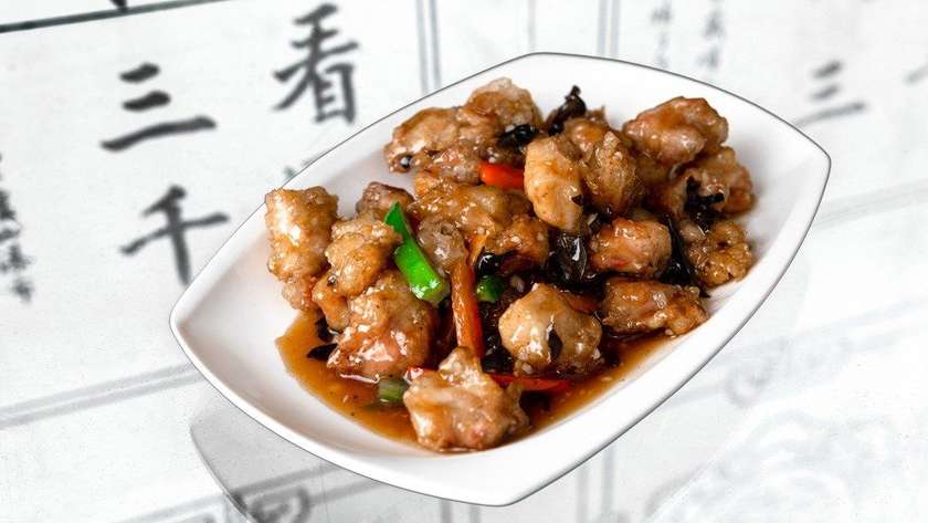 E11. Crispy chicken thigh meat sweet and sour