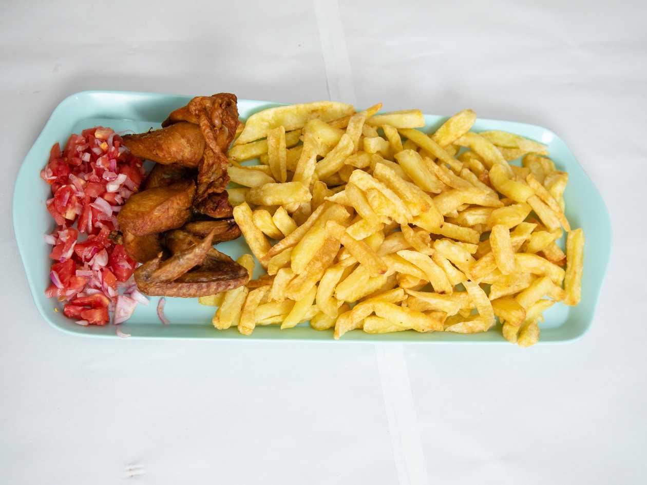 Chicken Quarter, Scoop of Chips, and Coleslaw