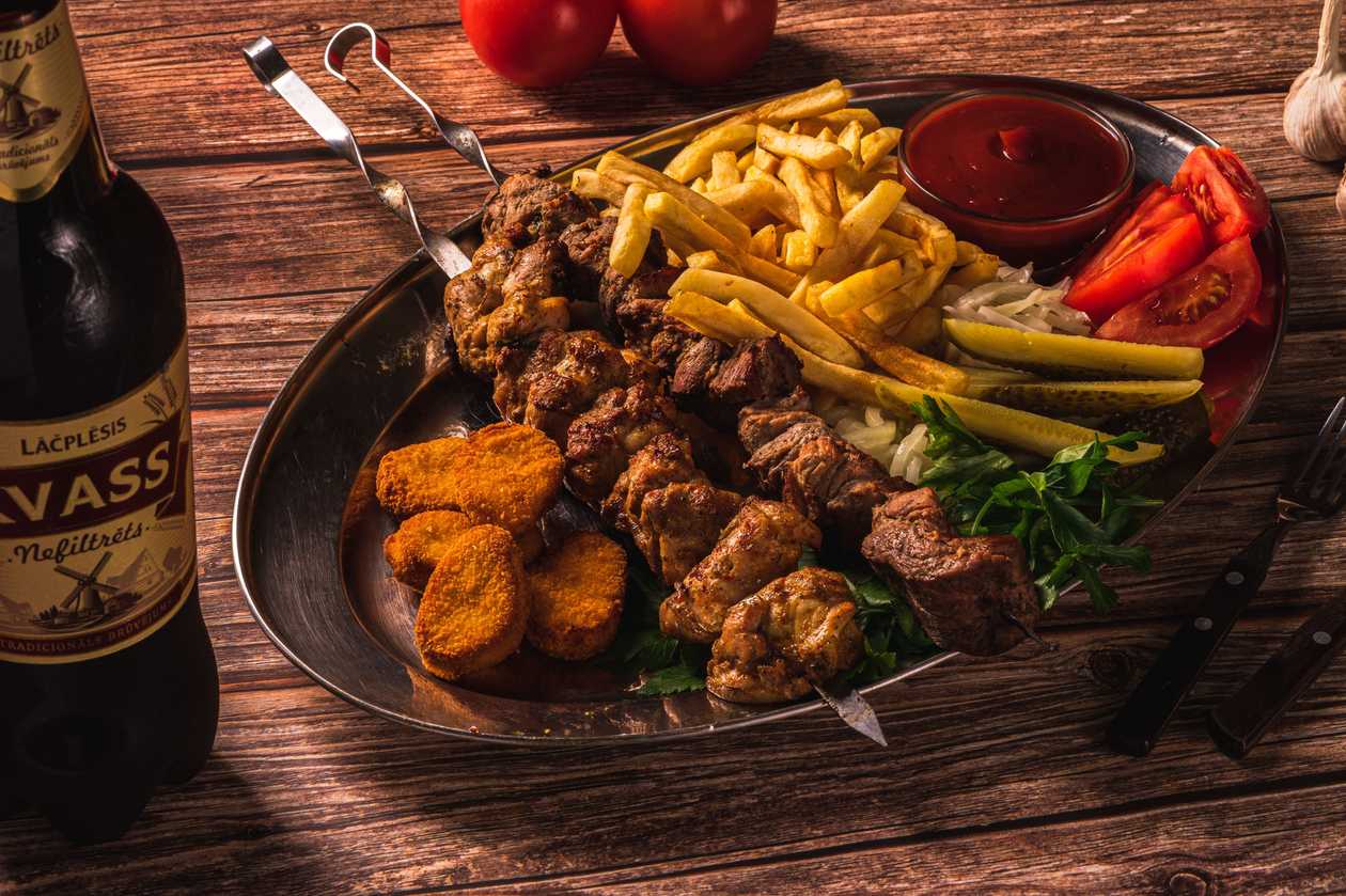 Pork and chicken shashlik with nuggets