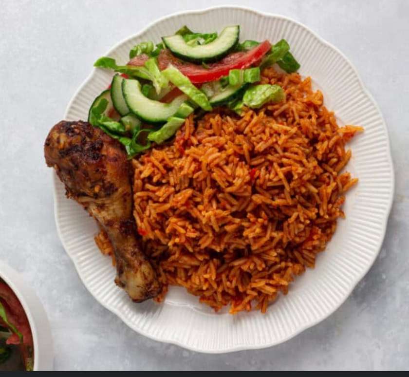 Jollof rice with chicken and coleslaw