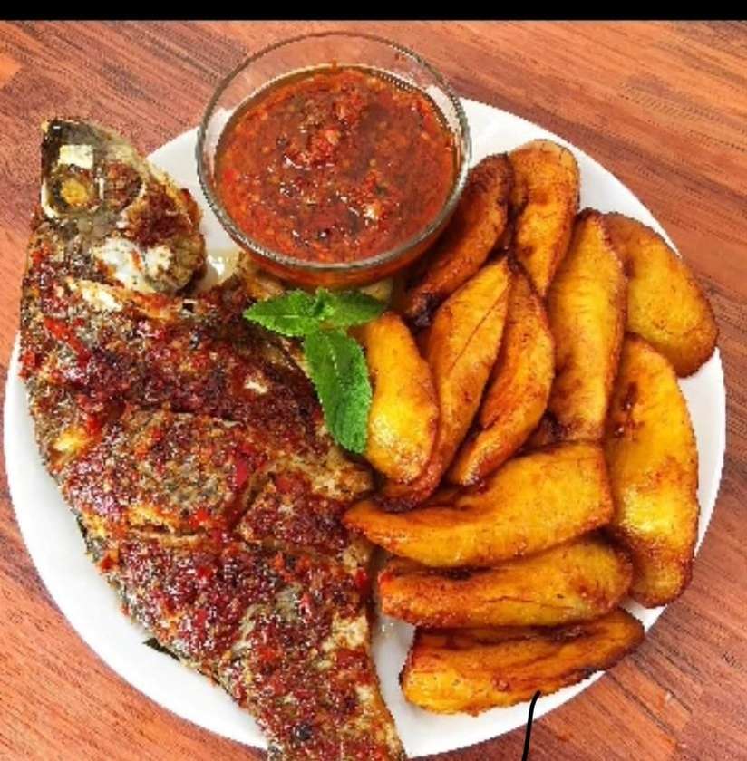 Full Tilapia Fish with Plantains and tomato stew
