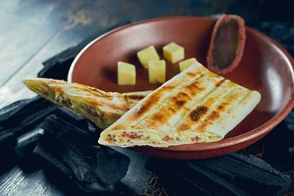 Lavash khorovadz with cheese and basturma