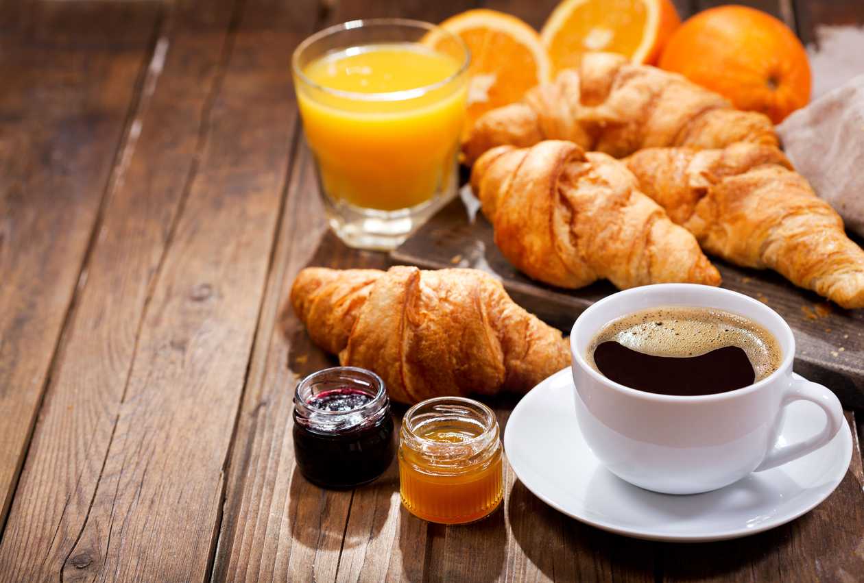 Coffee, croissant and fresh orange juice