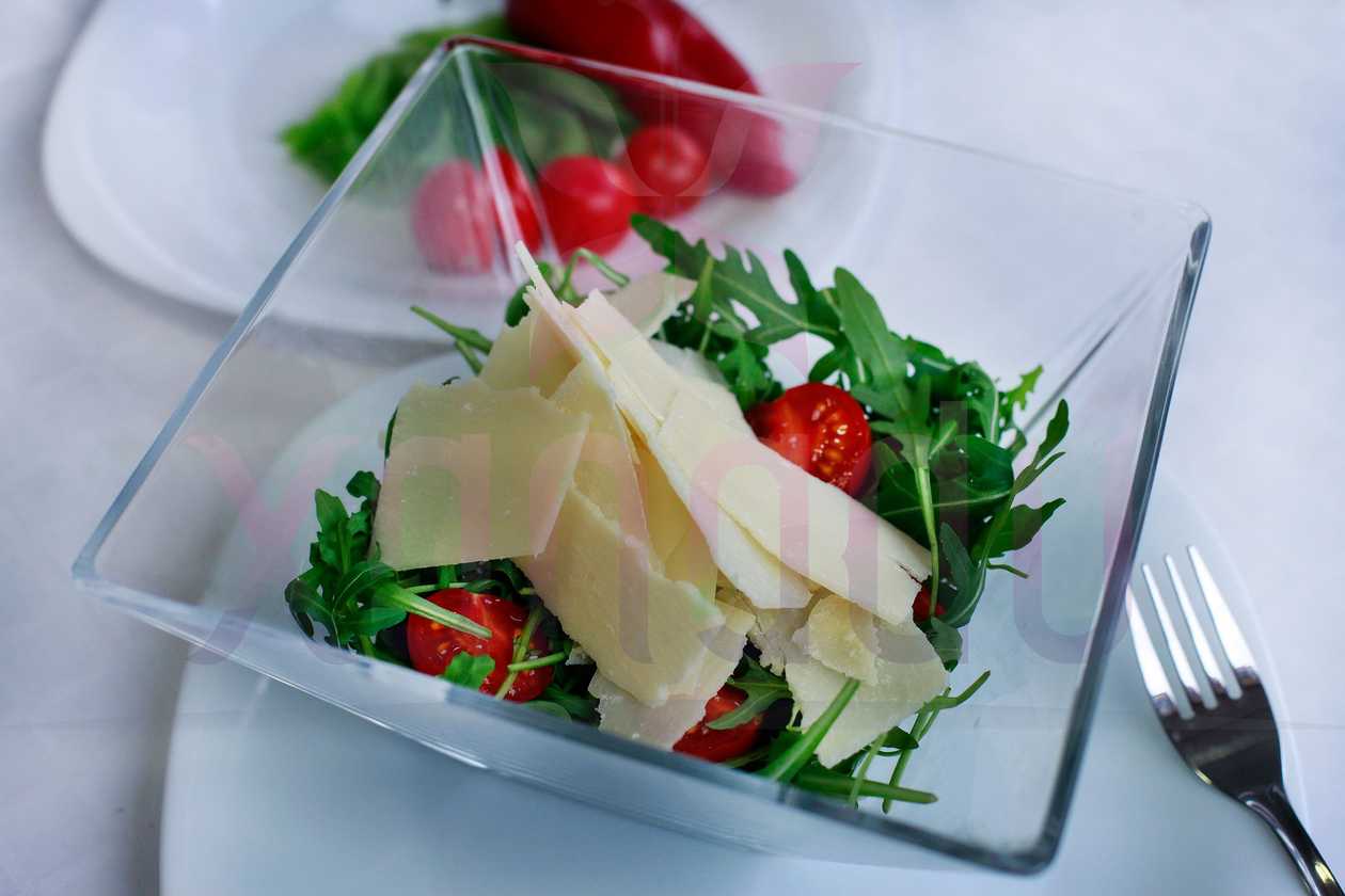 Arugula salad with cherry tomatoes and parmesan