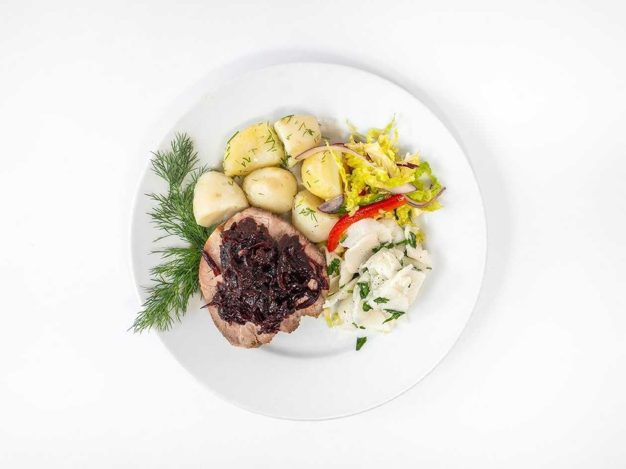 Baked pork neck with garnish